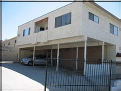 The first floor generally has large openings in the perimeter walls such as garages, tuck-under parking or