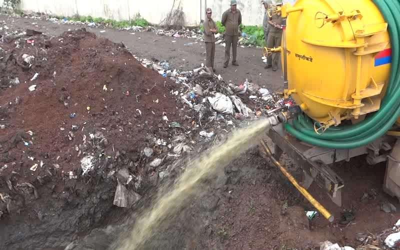 Crude Disposal of Septage at dump site A septic tank emptying truck