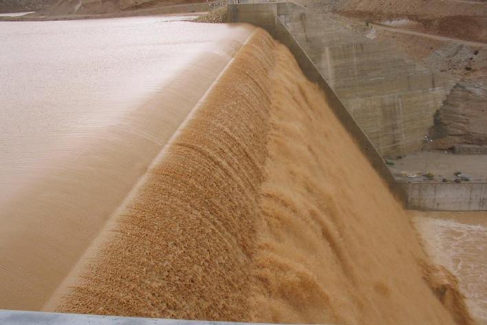 Surface water resources Winter flood at spillway of Wala dam.