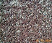 Numerous pigment colors are available; Earth tones are most common. Chip seal crack sealing. Worn chip seal surfacing with colored chips.