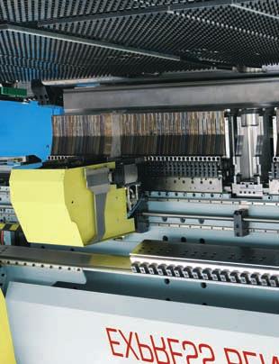 The system consists of two side transfer units each one supporting a set of narrow tool segments.