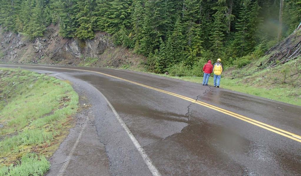 Figure 6. Embankment failure affecting entire roadway. Forest Service Road 25, Milepost 25. B.