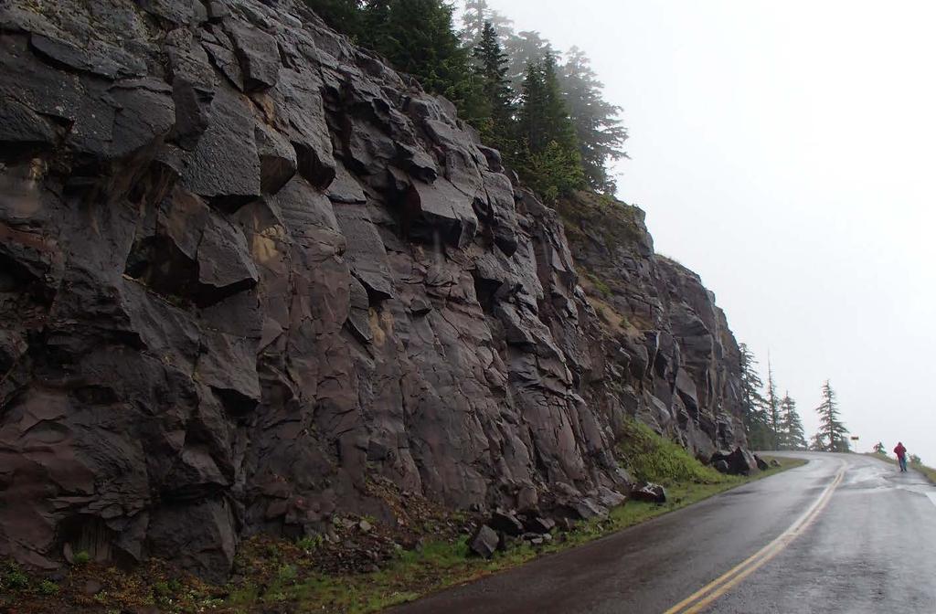 Figure 10. Rockfall debris in the roadside ditch can be used to help assess both block size/event volume and failure type. Forest Service Rd 25, Milepost 25.