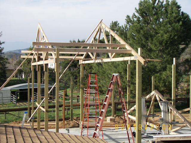 Figure 53-5 Figure 53-6 Install purlins over endwall truss top into earlier installed RT15 brackets.