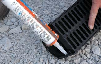 Place the drain onto the concrete bed and gently tap into place using a rubber mallet.