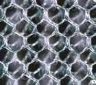 This barrier is similar to the original in that it minimizes visceral attachments to the mesh.