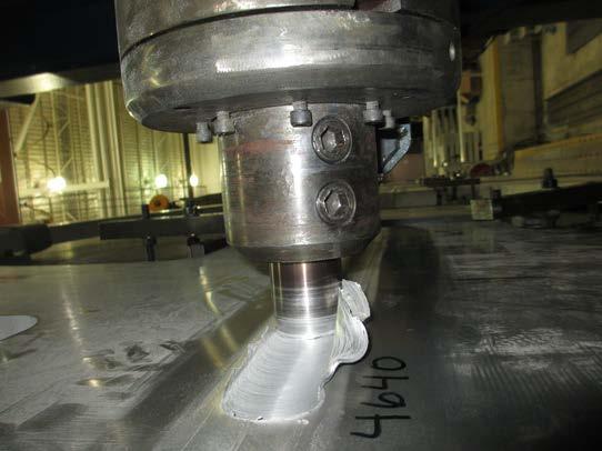 bend tests were considered a pass, since the cracks were very minor. Three tensile specimens were fabricated from the middle section of the welded plate and tested.