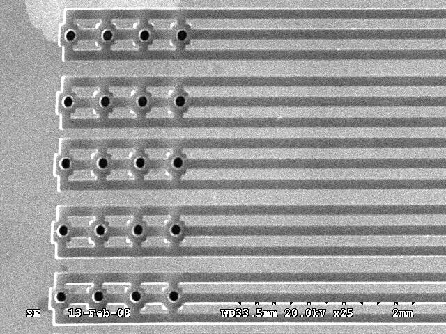 7d). Next, 15µm of Avatrel 2090P polymer is spin coated onto the wafer (Figure 7e). Afterwards, polymer sockets are patterned on top of the metal (Figure 7f, Figure 8).