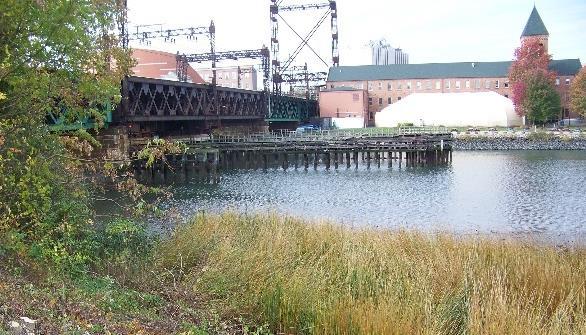 Environmental Impacts Historic Properties/Archeological Sites Adverse effects to: National Register-listed Walk Bridge Eligible Fort Point Street Bridge, walls,