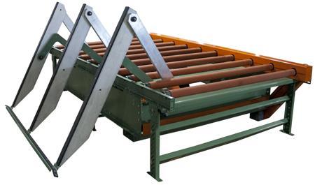 Sheet of plywood enters chain drag conveyor and is squared when it is fully conveyed into the stacker.