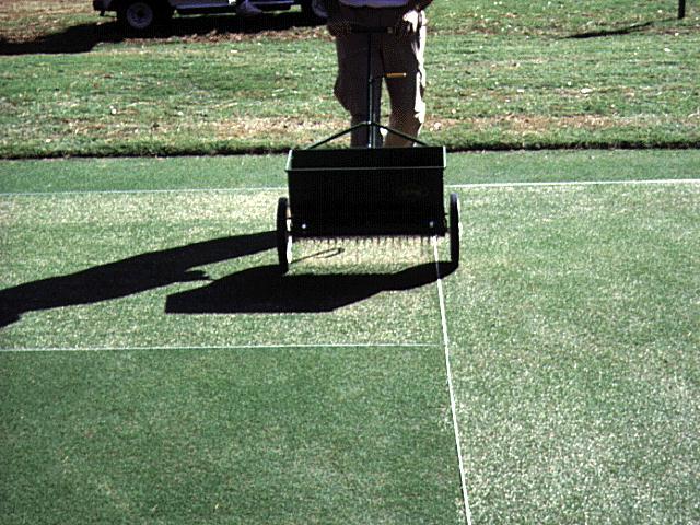 One way to ensure uniform application of material is to divide the material into two equal portions. Use a spreader calibration which will deliver one-half the correct amount of material.