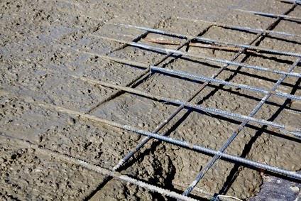 Reinforced concrete: an engineering composite Traditional concrete is made even stronger under tensile and flexural shear stresses by adding steel rods, wires, meshes.