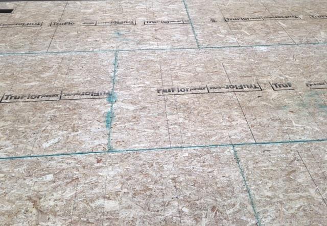 Construction - Floor Decking 4x8 Sheets of 19/32 Tongue & Groove, OSB decking is used in all floor