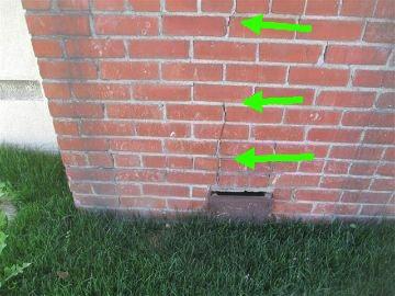 Chimney Flashing 3.1. The base flashing between the chimney and the roof are in acceptable condition. 4. Masonry Chimney 4.1. There are larger than typical cracks in the chimney bricks and grout joints.