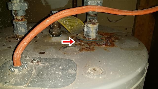 Corroded supply connection The top of the water heater is corroded. This condition could effect the life time expectancy of the unit. It should be monitor or repaired.