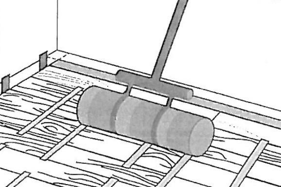 roller to apply pressure to installed sections while the adhesive is still