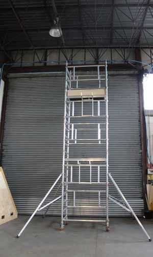 18. Now climb up to and through the trapdoor of the platform until you can sit on the platform with your feet on the rungs below (3T method) While sat on the platform take one of the brace frames