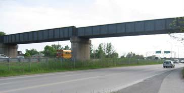 (Guelph Subdivision from Guelph to Georgetown, Halton Subdivision from Georgetown to Bramalea) the principal bottlenecks to consider are the crossing of the 400-series highways at Highways 410, 427
