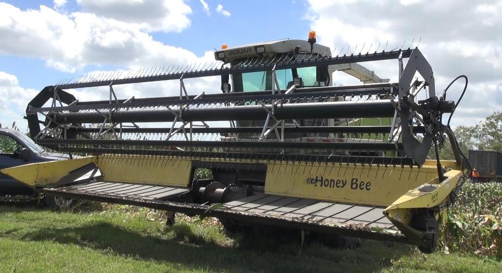 Image 4 Honey Bee draper style front used for harvesting white sorghum headlage.