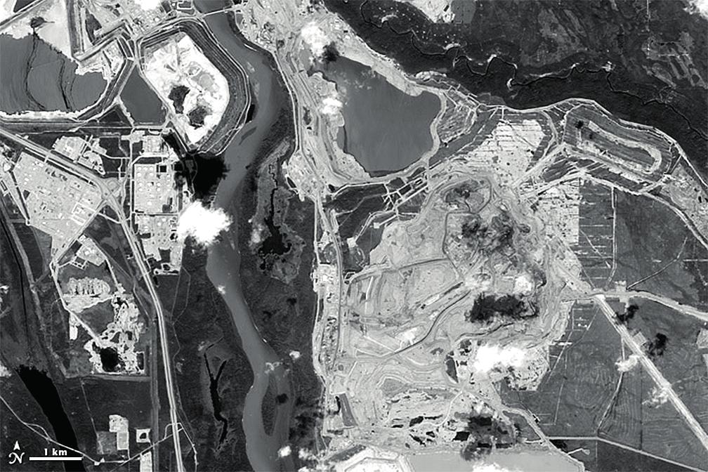 5 (c) Mining of tar (oil) sands tailing pond Athabasca River