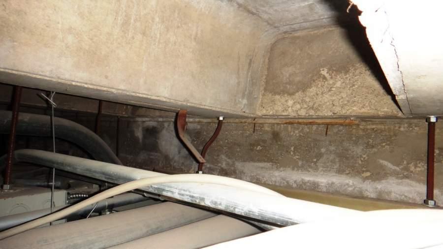 PHOTO #7 This photo shows the existing concrete pan joist floor system with interior cast-inplace beam at