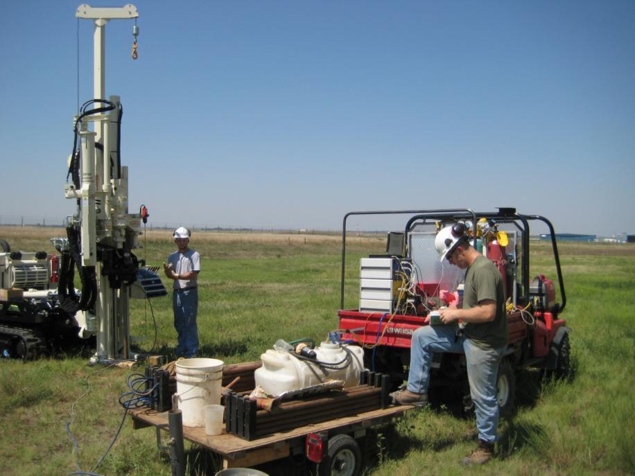 MIP System Field Test for Mid-Low Level TCE Dan Pip and Blake Slater of Geoprobe Systems running an MIP log at the Wall St. location in Salina, KS.