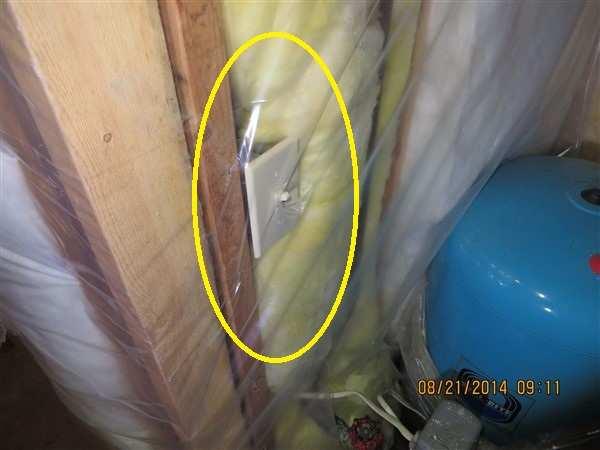 IMPACT/CONSEQUENCES: The plastic vapor barrier that is not properly sealed may interfere with the operation of the light switch.