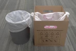 box/container lined with a used plastic bag.
