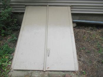1. Access Basement/Crawlspace Materials: "Bilco" style exterior entrance noted.