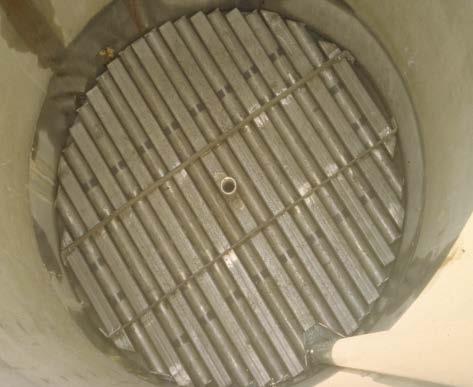 It provides support for the media and even distribution of air and water into the reactor. The underdrain includes a manifold and laterals to distribute the air evenly over the entire filter bottom.