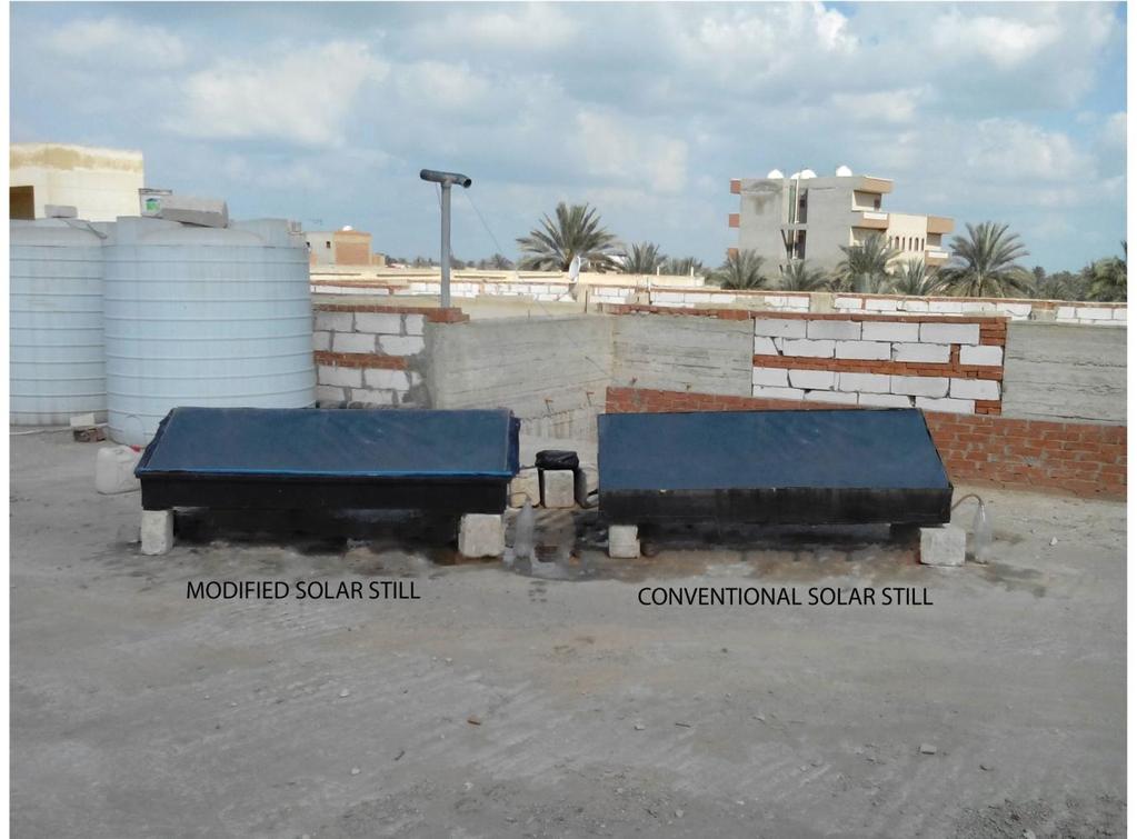 up of both stills is shown in Fig. 1. The setup consists of a saline water tank, a conventional still (single basin solar still) and a finned cover solar still. 2.