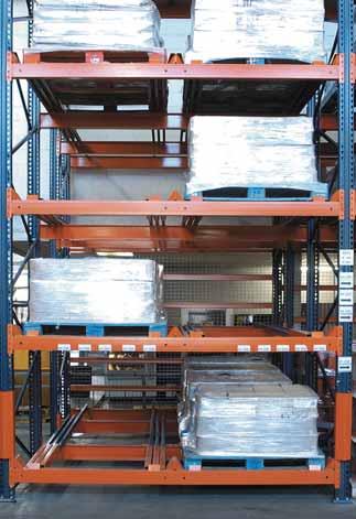 When loading the second pallet, the fork-lift pushes the first one along until it reaches the next set of trolleys, and deposits the pallet on these.