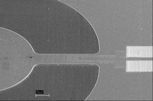 The sensing membranes are etched in (100)-oriented silicon by anisotropic etching using an aqueous KOH solution.