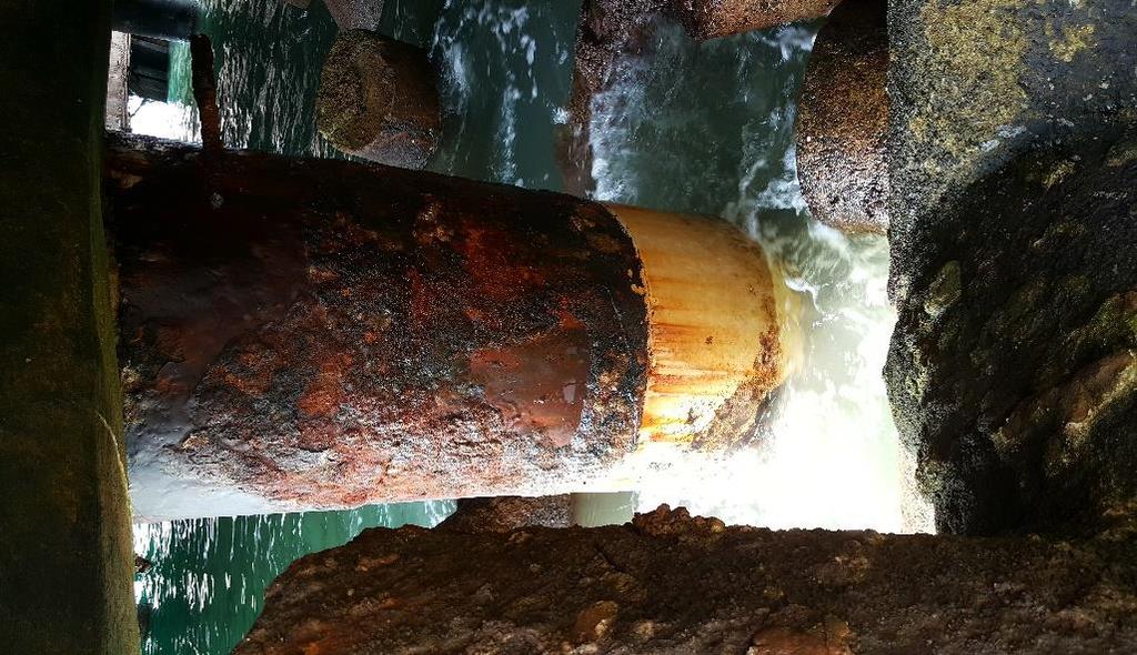 INTRODUCTION Once the corrosion process starts, it is accelerated by the presence of strong currents and tides, marine growth and foreign elements such as logs and other debris coming