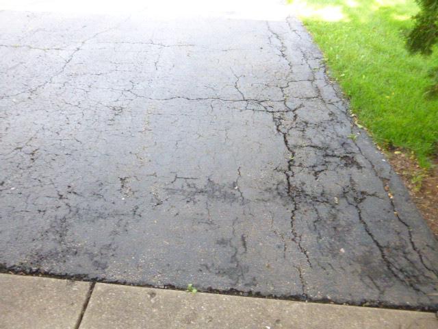 HOME INSPECTION REPORT GROUND & EXTERIOR STRUCTURES Repair damaged driveway. Repair uneven pavers at the front. Repair damaged deck. Repair uneven concrete sidewalk.
