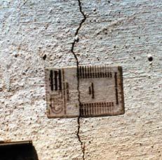 Structural Nature of the Crack Width of