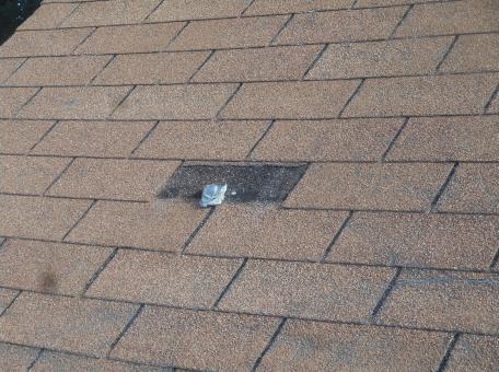 Some shingles in this area have been replaced.