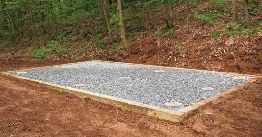 The gravel base prevents this and extends the life of the building.