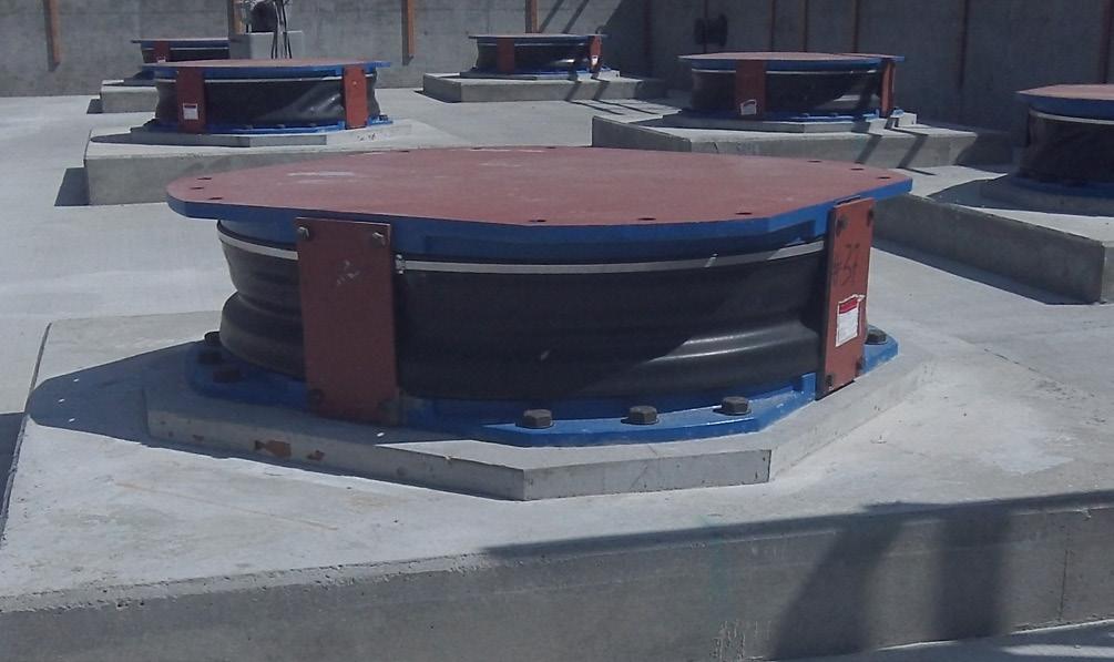 The VDD brace elements have a 440-kip design force with a +/- 5-in. stroke capacity. VDDs control seismic drift demands while the SMFs minimize uplift on the base seismic isolation system.