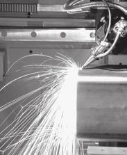 PLASMA PUNCH WITH SERVO DRILL The CNC programmable Whitney Plasma Punch Fabricating System features a 60-ton hydraulic punch, the Truecut Plasma Cutting System, and a servo drill with tapping