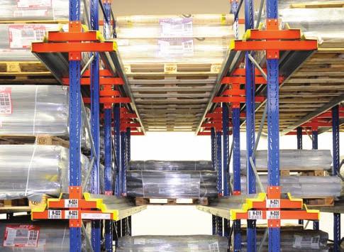 The pallets are stored in front of each other in a line (storage lanes) in individual rows with multiple storage levels.