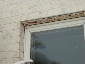 EXTERIOR INSPECTABLE ITEMS Wall Surfaces: MAINTENANCE - Sections of the wall surface is in need of paint or stain.