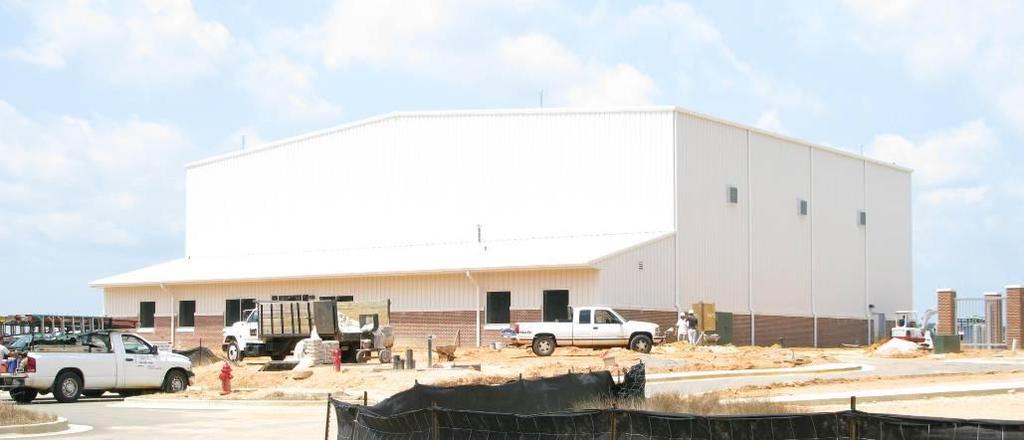 Metal building is erected and the hangar door installed.