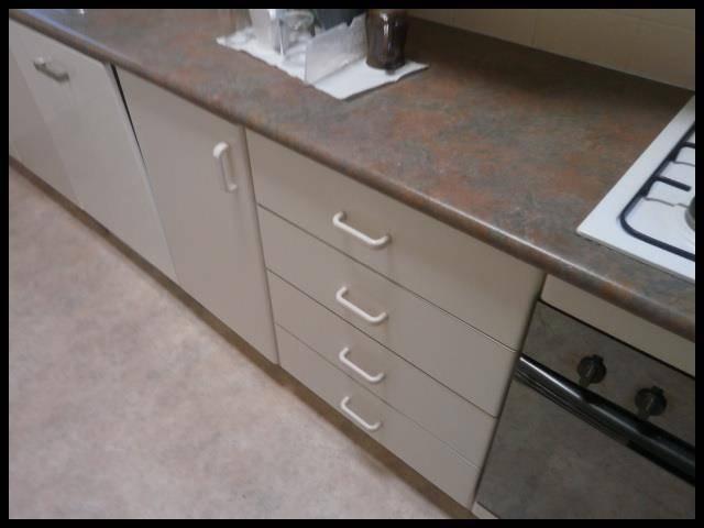Kitchen Fixtures: Tiles: Sink & Taps: The condition of the fixtures is generally good. Wear and tear is noted to cabinets and/or doors and some maintenance or repairs will be required.