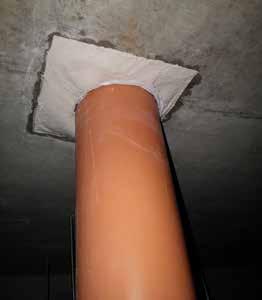Fire sealing of resultant openings where combustible plastic pipes pass through fire separating walls and floors.