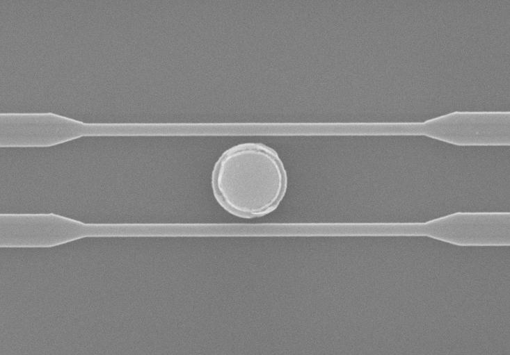 The photonic waveguides are 400nm in width. The separation from the microdisk to the photonic waveguide is 200nm.