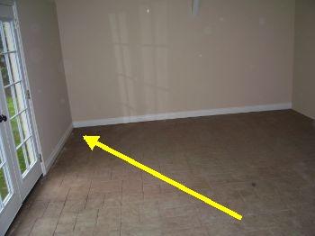 9. Fireplace 10. Floor Condition Materials: tile hardwood Hardwood floors in living room in good condition Family room tile on slab floor has noticable slope to North East Wall 11.