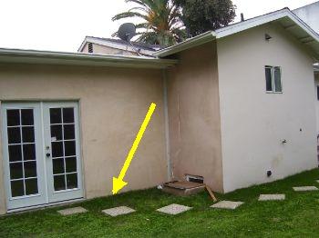 clearance between the sill plate and the soil to help prevent water intrusion See photo Location - East