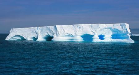 6 All life on Earth depends on water. The figure below shows an iceberg floating on the sea.