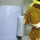 Dry Fabric Application Process Sealing and saturating the concrete with Sikadur epoxy resin.